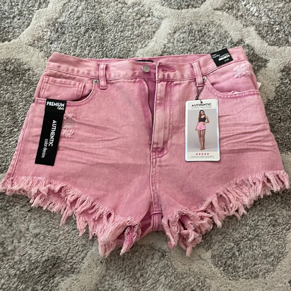 Pink frayed shorts